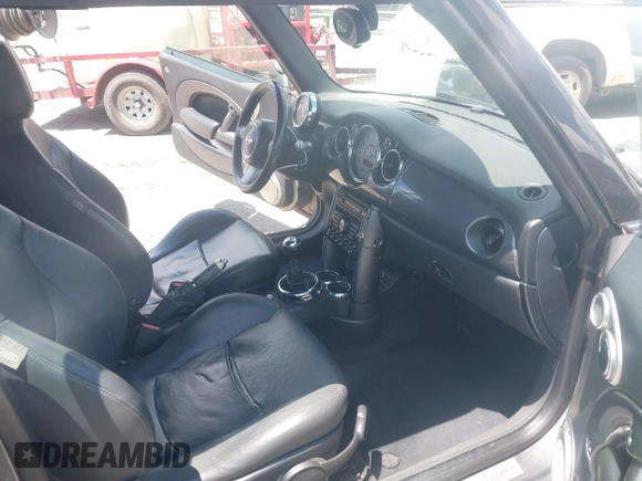 2005 MINI Convertible S with VIN WMWRH33495TF82332, listed as a IAAI auction lot 42248941 with 134,862 mi miles and . Bid and sale history available at DreamBid. Image 5.