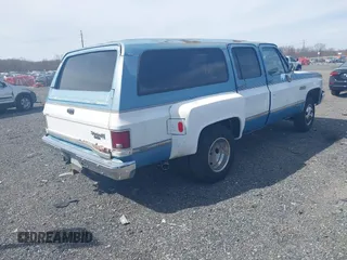 1987 GMC Suburban z VIN 1GKGR26NXHF533845, wystawiony jako IAAI lot #41845360 z przebiegiem 63 903 mil mil oraz . Historia ofert i sprzedaży dostępna na DreamBid. Obrazek 4.