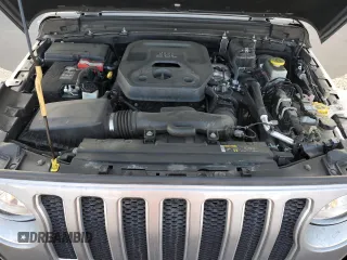 2019 Jeep Wrangler Unlimited Sahara with VIN 1C4HJXEN0KW616942, listed as a Copart auction lot 63501755 with 57,095 mi miles and Salvage title. Bid and sale history available at DreamBid. Image 12.