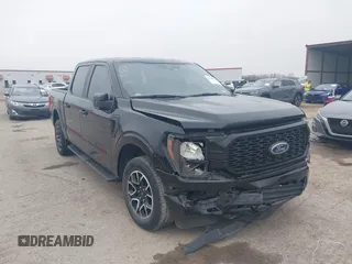 2023 Ford F-150 XL with VIN 1FTEW1C55PKD01184, listed as a IAAI auction lot 41700658 with 18,804 mi miles. Bid and sale history available at carsss.com. Image 1.