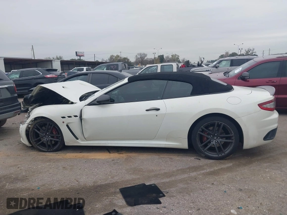 2013 Maserati GranTurismo Convertible Sport with VIN ZAM45VMA9D0070293, listed as a IAAI auction lot 41241020 with 69,156 mi miles. Bid and sale history available at carsss.com. Image 14.