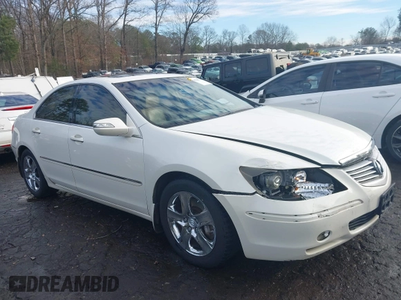 2006 Acura RL z VIN JH4KB16546C002058, wystawiony jako IAAI lot #41286711 z przebiegiem 297 234 mil mil oraz . Historia ofert i sprzedaży dostępna na DreamBid. Obrazek 13.