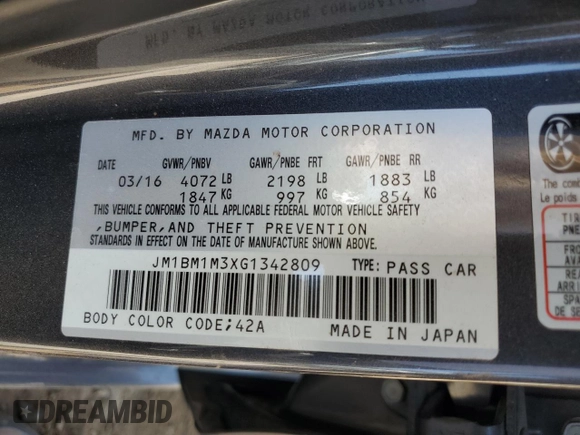 2016 Mazda 3 S Touring with VIN JM1BM1M3XG1342809, listed as a Copart auction lot 61915845 with 141,227 mi miles and Salvage title. Bid and sale history available at DreamBid. Image 12.