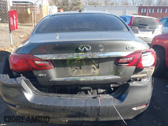 2015 Infiniti Q70 with VIN JN1BY1AR0FM562523, listed as a IAAI auction lot 41310831 with 73,870 mi miles and . Bid and sale history available at DreamBid. Image 16.