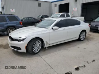 2018 BMW 7 Series 740i with VIN WBA7E2C53JB216348, listed as a Copart auction lot 62090275 with 77,924 mi miles and Salvage title. Bid and sale history available at DreamBid. Image 1.