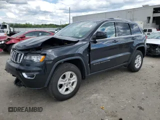2017 Jeep Grand Cherokee Laredo with VIN 1C4RJFAG0HC810855, listed as a Copart auction lot 58263065 with 93,951 mi miles and Salvage title. Bid and sale history available at DreamBid. Image 1.
