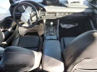 2019 Mazda 3 with VIN JM1BPBJM2K1131512, listed as a Copart auction lot 87112664 with Not provided miles and Salvage title. Bid and sale history available at DreamBid. Image 8.