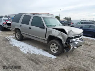 1998 Chevrolet Tahoe with VIN 1GNEK13R4WJ346417, listed as a IAAI auction lot 41390436 with 184,094 mi miles. Bid and sale history available at carsss.com. Image 1.
