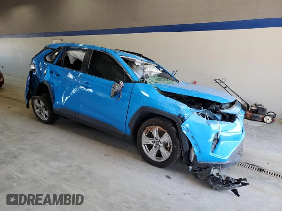 2019 Toyota RAV4 XLE with VIN 2T3P1RFV5KC009781, listed as a Copart auction lot 52262715 with Not Provided miles and Salvage Title. Bid and sale history available at DreamBid. Image 4.