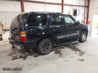 2003 Chevrolet Tahoe LT with VIN 1GNEC13Z43J340111, listed as a IAAI auction lot 41574135 with 251,307 mi miles. Bid and sale history available at carsss.com. Image 4.