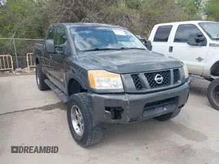 2011 Nissan Titan Pro-4X z VIN 1N6BA0EC3BN320795, wystawiony jako IAAI lot #41868113 z przebiegiem 183 919 mil mil oraz . Historia ofert i sprzedaży dostępna na DreamBid. Obrazek 1.