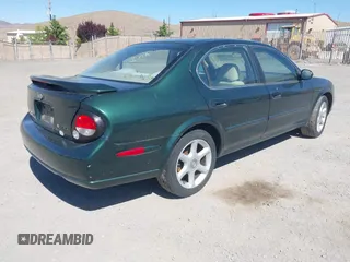 2000 Nissan Maxima GXE z VIN JN1CA31A8YT007617, wystawiony jako IAAI lot #42479039 z przebiegiem 165 950 mil mil oraz . Historia ofert i sprzedaży dostępna na DreamBid. Obrazek 4.