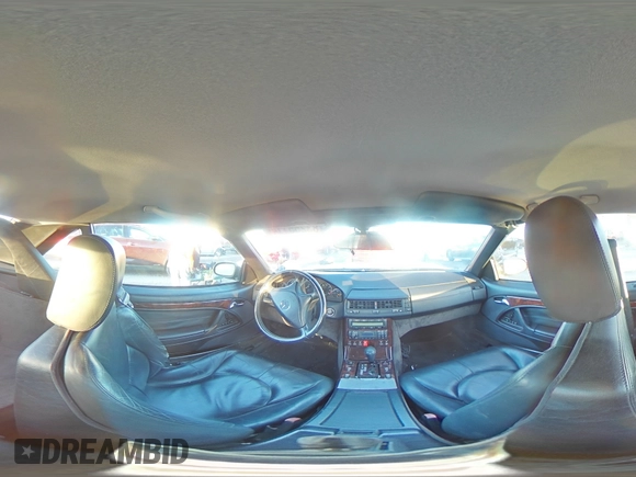 1999 Mercedes-Benz SL-Class with VIN WDBFA68F9XF178143, listed as a Copart auction lot 83255114 with 129,970 mi miles and Salvage Title. Bid and sale history available at carsss.com. Image 13.