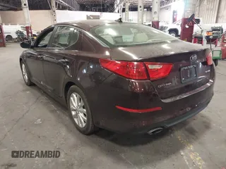 2015 Kia Optima EX with VIN 5XXGN4A70FG351257, listed as a IAAI auction lot 42485314 with 94,579 mi miles and . Bid and sale history available at DreamBid. Image 3.