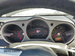 2004 Nissan 350Z Touring with VIN JN1AZ36A74T002301, listed as a Copart auction lot 61720524 with 101,779 mi miles and Salvage Title. Bid and sale history available at carsss.com. Image 9.