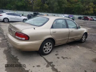 1998 Mazda 626 DX with VIN 1YVGF22C1W5762498, listed as a Copart auction lot 78283944 with 210,639 mi miles and Salvage Title. Bid and sale history available at carsss.com. Image 3.