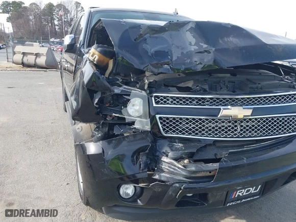 2011 Chevrolet Suburban LTZ with VIN 1GNSKKE37BR331312, listed as a IAAI auction lot 41618886 with 232,901 mi miles. Bid and sale history available at carsss.com. Image 6.