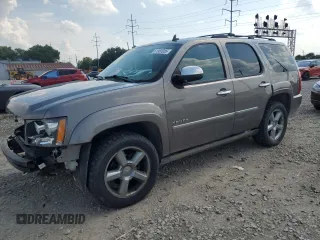 2011 Chevrolet Tahoe LTZ with VIN 1GNSKCE00BR203022, listed as a Copart auction lot 61963055 with 239,789 mi miles and Salvage title. Bid and sale history available at DreamBid. Image 1.