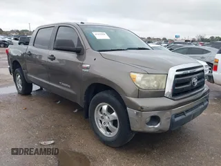 2010 Toyota Tundra with VIN 5TFEY5F14AX082299, listed as a IAAI auction lot 41433958 with 348,384 mi miles and . Bid and sale history available at DreamBid. Image 1.