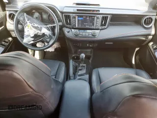 2018 Toyota RAV4 SE with VIN 2T3NFREV6JW436488, listed as a Copart auction lot 60297905 with 74,034 mi miles and Salvage title. Bid and sale history available at DreamBid. Image 8.
