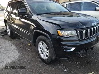 2020 Jeep Grand Cherokee Laredo E with VIN 1C4RJEAG7LC113542, listed as a Copart auction lot 62715585 with 64,124 mi miles and Salvage title. Bid and sale history available at DreamBid. Image 14.