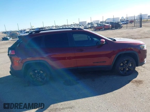 2019 Jeep Cherokee Latitude Plus with VIN 1C4PJMLX5KD456292, listed as a IAAI auction lot 40940110 with 95,622 mi miles and . Bid and sale history available at DreamBid. Image 13.