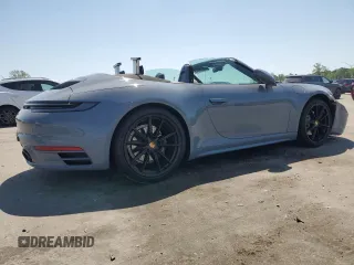 2023 Porsche 911 Carrera with VIN WP0CA2A9XPS238259, listed as a Copart auction lot 53636345 with 14,328 mi miles and Salvage title. Bid and sale history available at DreamBid. Image 3.