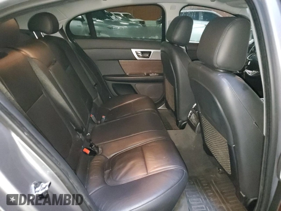 2015 Jaguar XF with VIN SAJXJ0EF1F8U48283, listed as a Copart auction lot 81004054 with 77,828 mi miles and Clean Title. Bid and sale history available at DreamBid. Image 10.