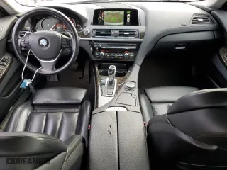 2016 BMW 6 Series 650i xDrive with VIN WBA6D6C52GG387898, listed as a Copart auction lot 77109254 with 106,134 mi miles and Salvage Title. Bid and sale history available at carsss.com. Image 8.