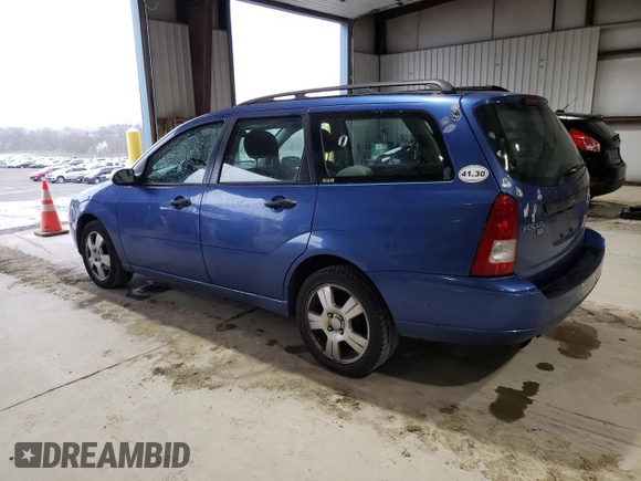 2005 Ford Focus SE with VIN 1FAHP36N65W187161, listed as a Copart auction lot 52024045 with 261,194 mi miles and Salvage Title. Bid and sale history available at carsss.com. Image 2.