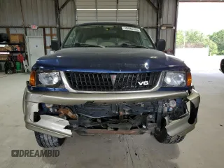 1999 Mitsubishi Montero z VIN JA4MT41R8XP039248, wystawiony jako Copart lot #58486465 z przebiegiem 183 316 mil mil oraz Szkoda całkowita • Salvage title. Historia ofert i sprzedaży dostępna na DreamBid. Obrazek 5.