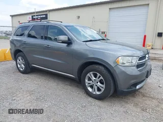 2012 Dodge Durango Crew with VIN 1C4RDJDG7CC112628, listed as a IAAI auction lot 42167214 with 144,898 mi miles. Bid and sale history available at carsss.com. Image 1.