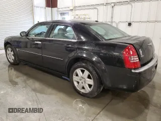 2006 Chrysler 300 C with VIN 2C3LK63H06H346022, listed as a Copart auction lot 74613344 with 200,509 mi miles and Salvage Title. Bid and sale history available at carsss.com. Image 2.