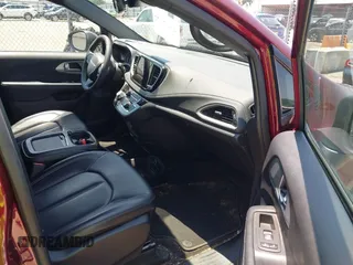 2023 Chrysler Pacifica Touring L with VIN 2C4RC1BG7PR513017, listed as a IAAI auction lot 42441272 with 23,310 mi miles and . Bid and sale history available at DreamBid. Image 5.