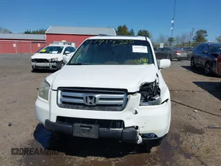 2007 Honda Pilot EX-L with VIN 2HKYF185X7H515012, listed as a IAAI auction lot 41914750 with 231,177 mi miles. Bid and sale history available at carsss.com. Image 12.
