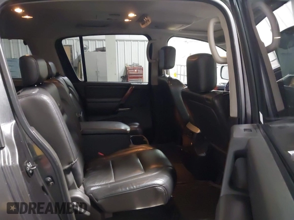2004 Infiniti QX56 with VIN 5N3AA08C14N812225, listed as a IAAI auction lot 41496326 with 213,916 mi miles. Bid and sale history available at carsss.com. Image 8.