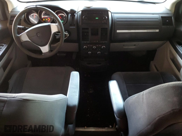 2009 Dodge Grand Caravan SE with VIN 1D8HN44E09B511597, listed as a Copart auction lot 61754875 with 410,045 mi miles and Clean title. Bid and sale history available at DreamBid. Image 8.