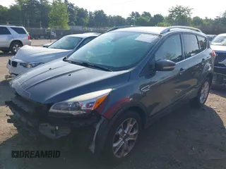 2016 Ford Escape Titanium with VIN 1FMCU9J99GUB27573, listed as a IAAI auction lot 42445457 with 156,784 mi miles and . Bid and sale history available at DreamBid. Image 18.