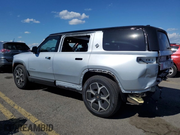2024 Rivian R1S Adventure with VIN 7PDSGBBA4RN036045, listed as a Copart auction lot 74982414 with 9,256 mi miles and Salvage Title. Bid and sale history available at carsss.com. Image 2.