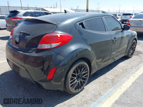 2013 Hyundai Veloster w/Black Int with VIN KMHTC6AD4DU151409, listed as a IAAI auction lot 42639582 with 283,208 mi miles and . Bid and sale history available at DreamBid. Image 4.