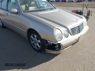 2002 Mercedes-Benz E-Class with VIN WDBJF65J92B479841, listed as a IAAI auction lot 41471955 with 203,527 mi miles. Bid and sale history available at carsss.com. Image 6.