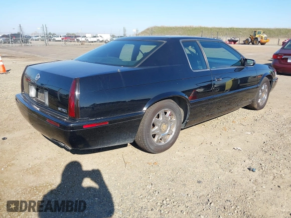 2001 Cadillac Eldorado Touring ETC z VIN 1G6ET12961B100627, wystawiony jako IAAI lot #41458966 z przebiegiem 113 620 mil mil oraz . Historia ofert i sprzedaży dostępna na DreamBid. Obrazek 4.