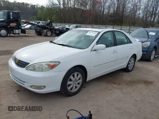 2003 Toyota Camry LE with VIN 4T1BE30K73U227420, listed as a IAAI auction lot 41838940 with 213,470 mi miles and . Bid and sale history available at DreamBid. Image 2.