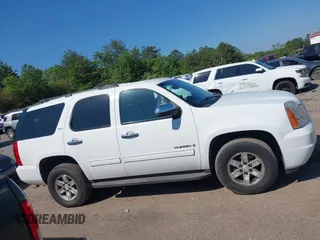 2009 GMC Yukon SLT w/4SA with VIN 1GKFK33049R241378, listed as a IAAI auction lot 42124385 with 292,192 mi miles. Bid and sale history available at carsss.com. Image 13.