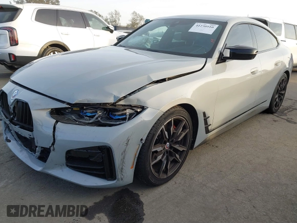 2023 BMW 4 Series M440i with VIN WBA63AW02PFN40551, listed as a IAAI auction lot 41230910 with 23,526 mi miles and . Bid and sale history available at DreamBid. Image 2.