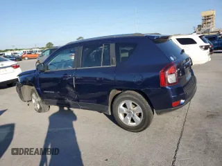 2014 Jeep Compass Sport with VIN 1C4NJCBA5ED749869, listed as a Copart auction lot 52779135 with 166,962 mi miles and Salvage Title. Bid and sale history available at carsss.com. Image 2.