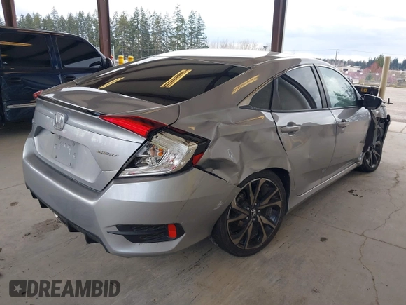 2021 Honda Civic Sport with VIN 2HGFC2F83MH521470, listed as a IAAI auction lot 41828890 with 49,703 mi miles and . Bid and sale history available at DreamBid. Image 4.