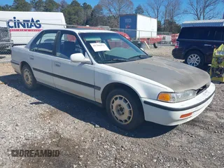 1992 Honda Accord LX with VIN JHMCB7659NC048944, listed as a IAAI auction lot 41704471 with 253,535 mi miles. Bid and sale history available at carsss.com. Image 1.
