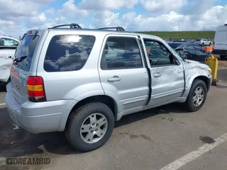 2005 Ford Escape Limited with VIN 1FMYU04165KB19009, listed as a IAAI auction lot 39055762 with 180,484 mi miles. Bid and sale history available at carsss.com. Image 4.