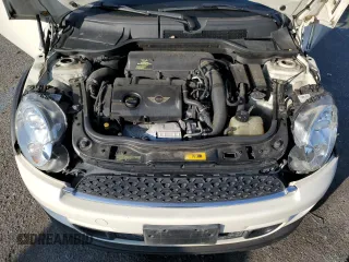 2013 MINI Roadster S z VIN WMWSY3C53DT565290, wystawiony jako Copart lot #72644654 z przebiegiem 104 007 mil mil oraz Szkody całkowita. Historia ofert i sprzedaży dostępna na DreamBid. Obrazek 12.
